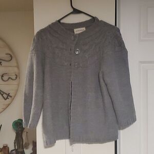 Three top button knit sweater